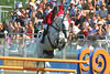 Cum Laude is a mirror image of his famous sire Clinton, here shown with Dirk Demeersman at the Olympic Games in Athens 2004.
