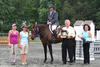 with Bruce on board they won right out of the \"starting gate\" at one of the first horse shows in Nadia\'s life.